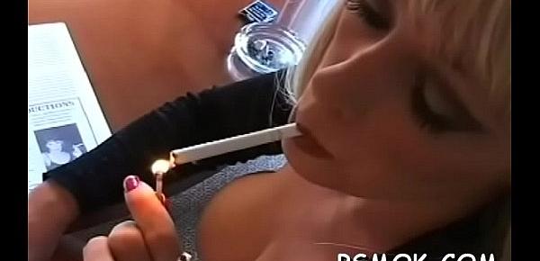  Hot sweetheart touches herself whilst relishing a cigarette